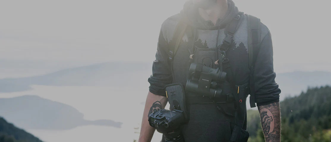 Man wearing binocular harnesses