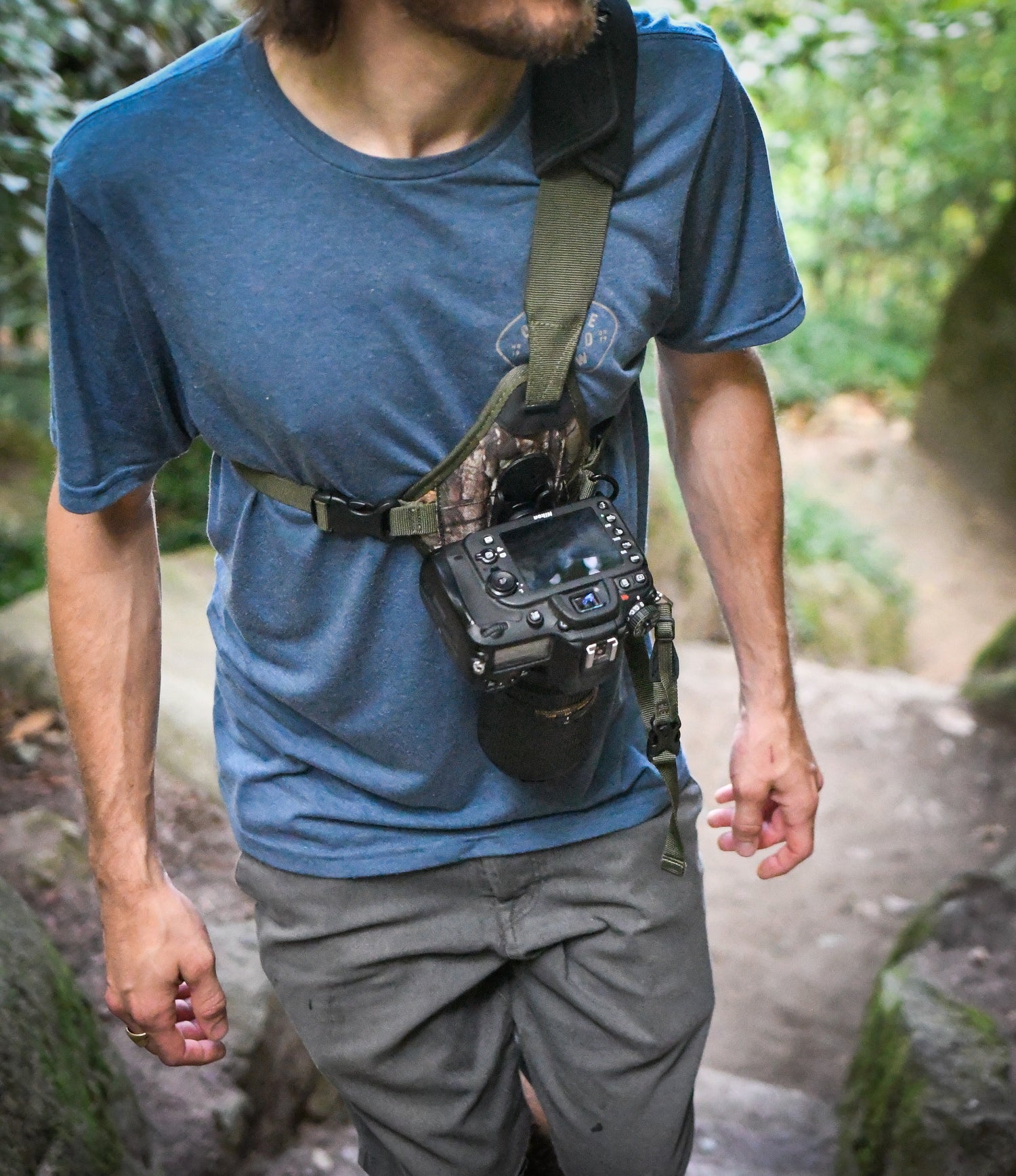 Photographer wearing a Skout G2 from Cotton Camera Carrying Systems - also known as a Cotton Carrier