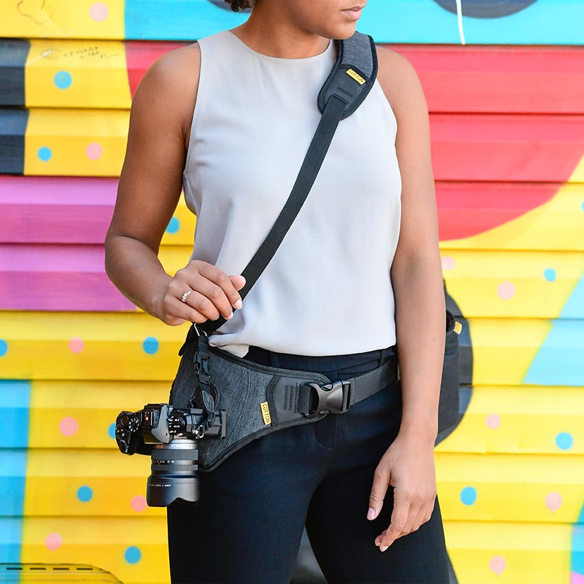 Outdoor photography camera sling features