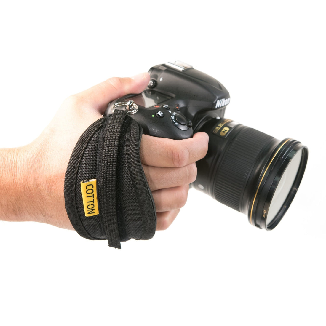 Cotton Carrier hand grip camera strap attached to Nikon DSLR body