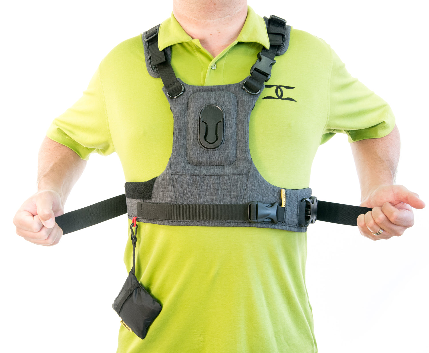 Man demonstrating tightening G3 camera harness around waist